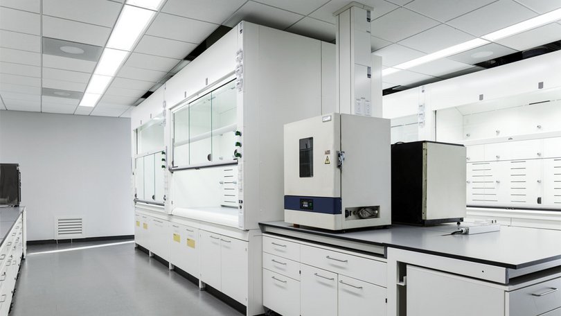 White laboratory with fume hoods, CJ Suwon