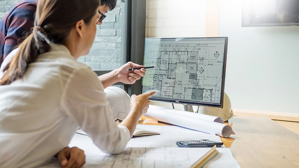 People working on a computer together